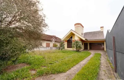 Casa em condomínio fechado com 4 quartos à venda na rua primeiro de maio, 856, niterói, canoas, 330 m2 por r$ 1.615.000