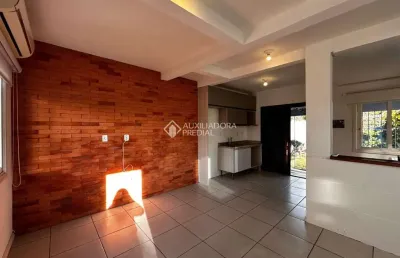 Casa em condomínio fechado com 3 quartos à venda na rua flórida, 566, mato grande, canoas, 72 m2 por r$ 270.000