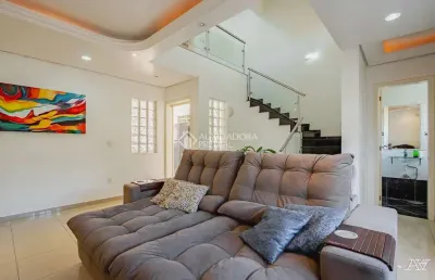 Casa em condomínio fechado com 4 quartos à venda na rua da alegria, 136, estância velha, canoas, 190 m2 por r$ 949.000