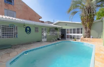 Casa em condomínio fechado com 3 quartos à venda na rua pistoia, 864, rio branco, canoas, 220 m2 por r$ 599.000