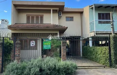 Casa em condomínio fechado com 3 quartos à venda na rua felipe de oliveira, 85, harmonia, canoas, 176 m2 por r$ 399.000