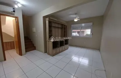 Casa em condomínio fechado com 3 quartos à venda na rua república, 2708, harmonia, canoas, 88 m2 por r$ 470.000