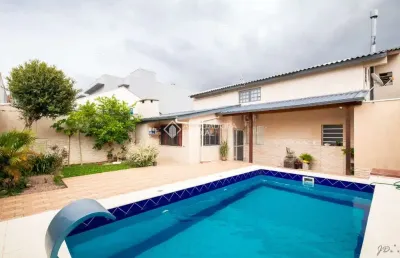 Casa em condomínio fechado com 4 quartos à venda na rua das petúnias, 725, estância velha, canoas, 298 m2 por r$ 954.000