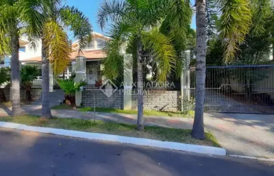 Casa em condomínio fechado com 5 quartos à venda na rua país de gales, 41, marechal rondon, canoas, 333 m2 por r$ 2.500.000