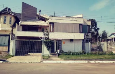 Casa em condomínio fechado com 3 quartos à venda na rua marco aurélio hidalgo, 17, nossa senhora das graças, canoas, 173 m2 por r$ 790.000