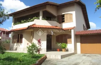 Casa em condomínio fechado com 3 quartos à venda na rua tamoio, 2292, niterói, canoas, 240 m2 por r$ 950.000