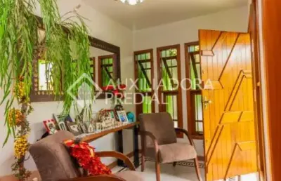 Casa em condomínio fechado com 4 quartos à venda na rua santa terezinha, 615, nossa senhora das graças, canoas, 496 m2 por r$ 1.730.000