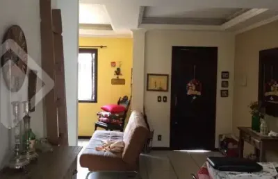 Casa em condomínio fechado com 4 quartos à venda na rua cidade de santa-fé, 150, mato grande, canoas, 137 m2 por r$ 426.000