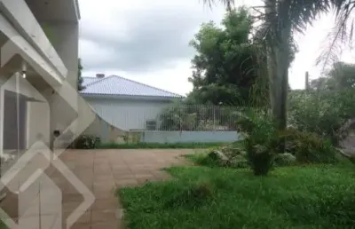 Casa em condomínio fechado com 5 quartos à venda na rua santa terezinha, 286, nossa senhora das graças, canoas, 372 m2 por r$ 750.000