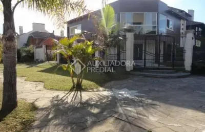 Casa em condomínio fechado com 4 quartos à venda na rua gabriel miro, 230, marechal rondon, canoas, 370 m2 por r$ 2.128.000