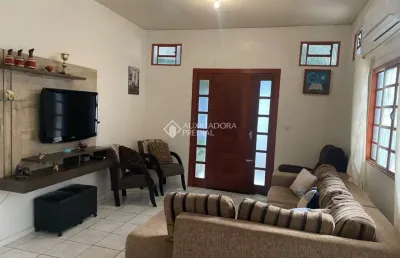 Casa em condomínio fechado com 3 quartos à venda na rua lyra, 183, estância velha, canoas, 230 m2 por r$ 999.990