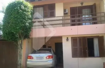 Casa em condomínio fechado com 2 quartos à venda na avenida juca batista, 1490, belém novo, porto alegre, 123 m2 por r$ 600.000