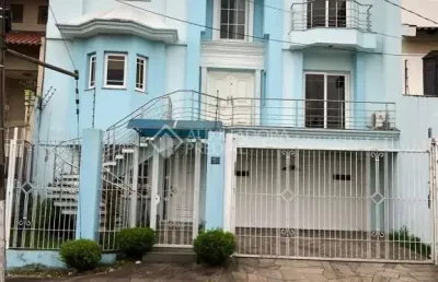 Casa em condomínio fechado com 3 quartos à venda na rua vinícius de moraes, 71, marechal rondon, canoas, 390 m2 por r$ 2.500.000