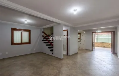 Casa em condomínio fechado com 3 quartos à venda na rua república, 2050, harmonia, canoas, 135 m2 por r$ 550.000