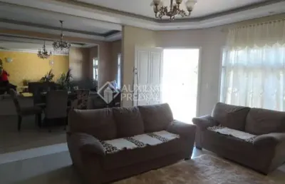 Casa em condomínio fechado com 3 quartos à venda na rua andrômeda, 359, estância velha, canoas, 224 m2 por r$ 1.050.000