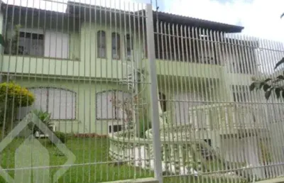 Casa em condomínio fechado com 4 quartos à venda na rua tietê, 375, igara, canoas, 220 m2 por r$ 1.500.000