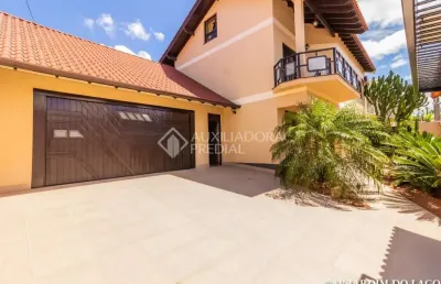 Casa em condomínio fechado com 3 quartos à venda na rua taurus, 198, moinhos de vento, canoas, 350 m2 por r$ 1.598.000