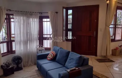 Casa em condomínio fechado com 3 quartos à venda na avenida doutor sezefredo azambuja vieira, 2553, estância velha, canoas, 185 m2 por r$ 1.280.000