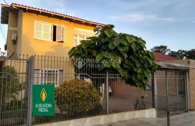 Casa com 4 quartos à venda na rua coronel camisão, 123, harmonia, canoas, 130 m2 por r$ 750.000
