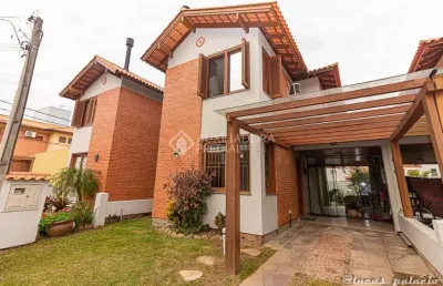 Casa em condomínio fechado com 3 quartos à venda na rua dos jasmins, 120, igara, canoas, 117 m2 por r$ 750.000