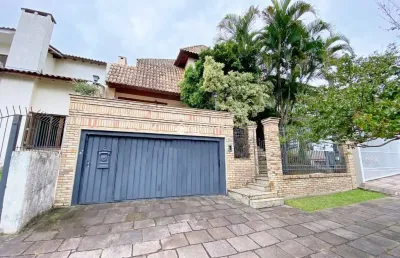 Casa com 4 quartos à venda na rua comendador creidy, 77, chácara das pedras, porto alegre, 400 m2 por r$ 1.400.000