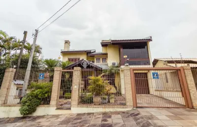 Casa em condomínio fechado com 4 quartos à venda na travessa porto príncipe, 59, jardim lindóia, porto alegre, 304 m2 por r$ 1.650.000