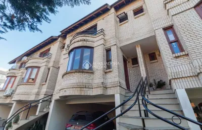 Casa em condomínio fechado com 3 quartos à venda na rua curupaiti, 260, cristal, porto alegre, 182 m2 por r$ 750.000