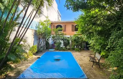 Casa com 6 quartos à venda na rua felipe de oliveira, 734, petrópolis, porto alegre, 400 m2 por r$ 1.680.000