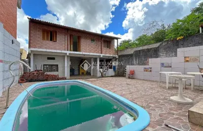 Casa com 3 quartos à venda na rua álvaro nicofé, 150, vila jardim, porto alegre, 528 m2 por r$ 550.000
