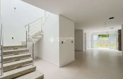 Casa com 3 quartos à venda na avenida josé gertum, 570, chácara das pedras, porto alegre, 184 m2 por r$ 1.280.000
