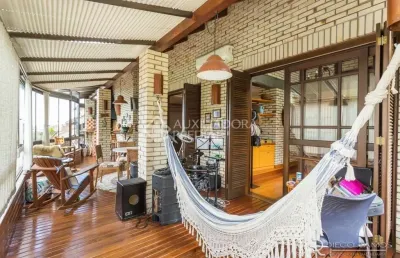 Casa em condomínio fechado com 4 quartos à venda na rua erechim, 100, nonoai, porto alegre, 331 m2 por r$ 1.050.000