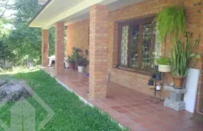 Casa em condomínio fechado com 3 quartos à venda na estrada kanazawa, 84, vila nova, porto alegre, 300 m2 por r$ 700.000