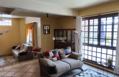 Casa com 3 quartos à venda na rua itaboraí, 1335, jardim botânico, porto alegre, 266 m2 por r$ 1.600.000