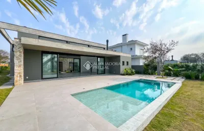 Casa em condomínio fechado com 5 quartos à venda na avenida juca batista, 8000, chapéu do sol, porto alegre, 389 m2 por r$ 4.450.000
