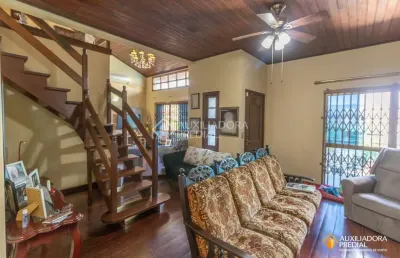 Casa em condomínio fechado com 4 quartos à venda na rua eleutério araújo, 88, partenon, porto alegre, 450 m2 por r$ 850.000
