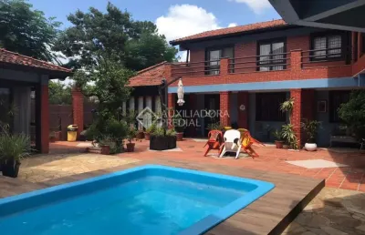 Casa em condomínio fechado com 4 quartos à venda na rua walter kaufmann, 6, jardim itu sabará, porto alegre, 357 m2 por r$ 1.600.000