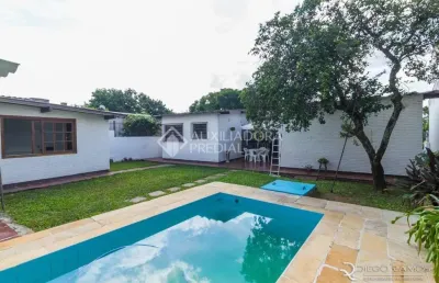 Casa em condomínio fechado com 4 quartos à venda na rua joão paetzel, 821, chácara das pedras, porto alegre, 300 m2 por r$ 1.590.000