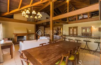 Casa em condomínio fechado com 4 quartos à venda na avenida juca batista, 8000, belém novo, porto alegre, 484 m2 por r$ 5.000.000