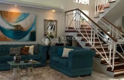 Casa com 3 quartos à venda na rua doutor paulino guerra, 46, jardim itu sabará, porto alegre, 282 m2 por r$ 1.300.000
