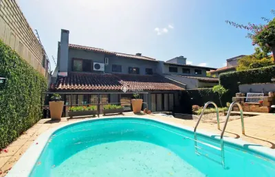 Casa com 4 quartos à venda na rua dona lida monteiro, 140, teresópolis, porto alegre, 195 m2 por r$ 1.220.000