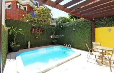 Casa com 4 quartos à venda na rua doutor barbosa gonçalves, 490, chácara das pedras, porto alegre, 252 m2 por r$ 1.499.000