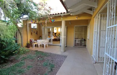 Casa com 4 quartos à venda na rua itaboraí, 1009, jardim botânico, porto alegre, 355 m2 por r$ 2.800.000