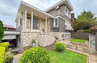 Casa com 5 quartos à venda na rua acélio daudt, 135, passo da areia, porto alegre, 283 m2 por r$ 1.808.000