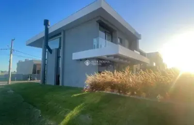 Casa em condomínio fechado com 4 quartos à venda na rua rio divisa, 32, centro, xangri-lá, 224 m2 por r$ 2.299.000