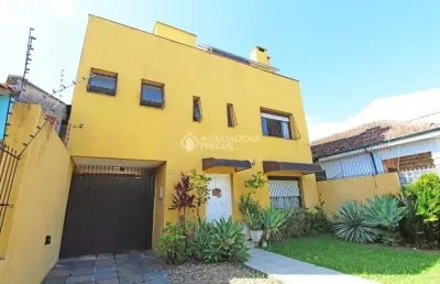 Casa com 3 quartos à venda na rua monteiro lobato, 303, partenon, porto alegre, 308 m2 por r$ 1.160.000