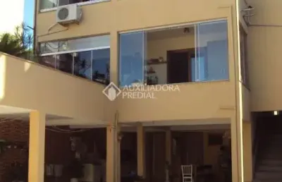 Casa com 3 quartos à venda na avenida benno mentz, 1088, vila ipiranga, porto alegre, 290 m2 por r$ 1.200.000