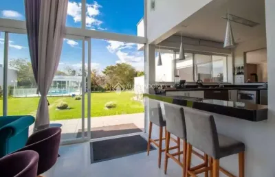 Casa em condomínio fechado com 5 quartos à venda na lomba do vadeco, 825, morada gaúcha, gravataí, 316 m2 por r$ 2.200.000