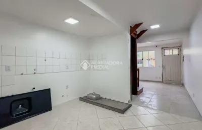 Casa em condomínio fechado com 2 quartos à venda na avenida faria lobato, 1120, sarandi, porto alegre, 66 m2 por r$ 269.000