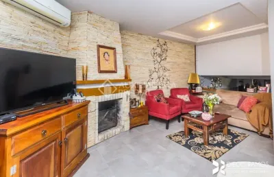 Casa em condomínio fechado com 3 quartos à venda na rua erechim, 100, nonoai, porto alegre, 199 m2 por r$ 650.000