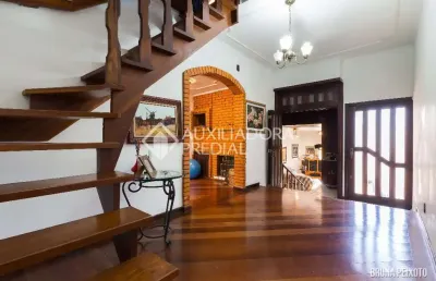Casa em condomínio fechado com 4 quartos à venda na rua alberto silva, 818, vila ipiranga, porto alegre, 340 m2 por r$ 1.650.000